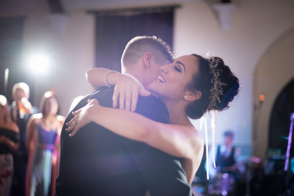 Bride and groom hugging during their first dance