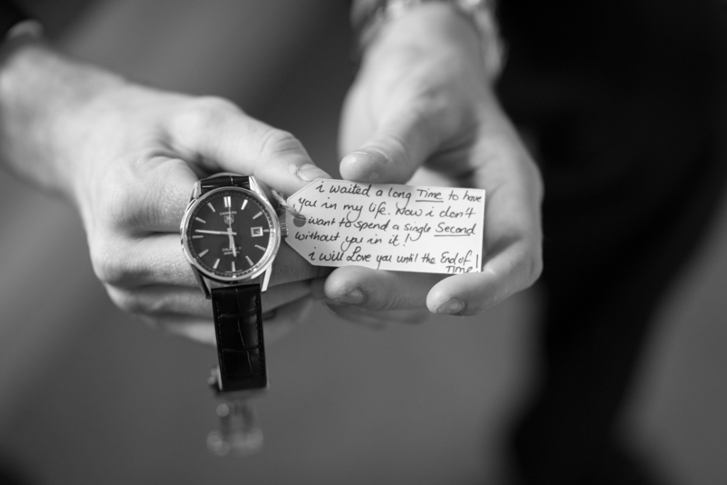 Grooms watch with a note from the bride on it