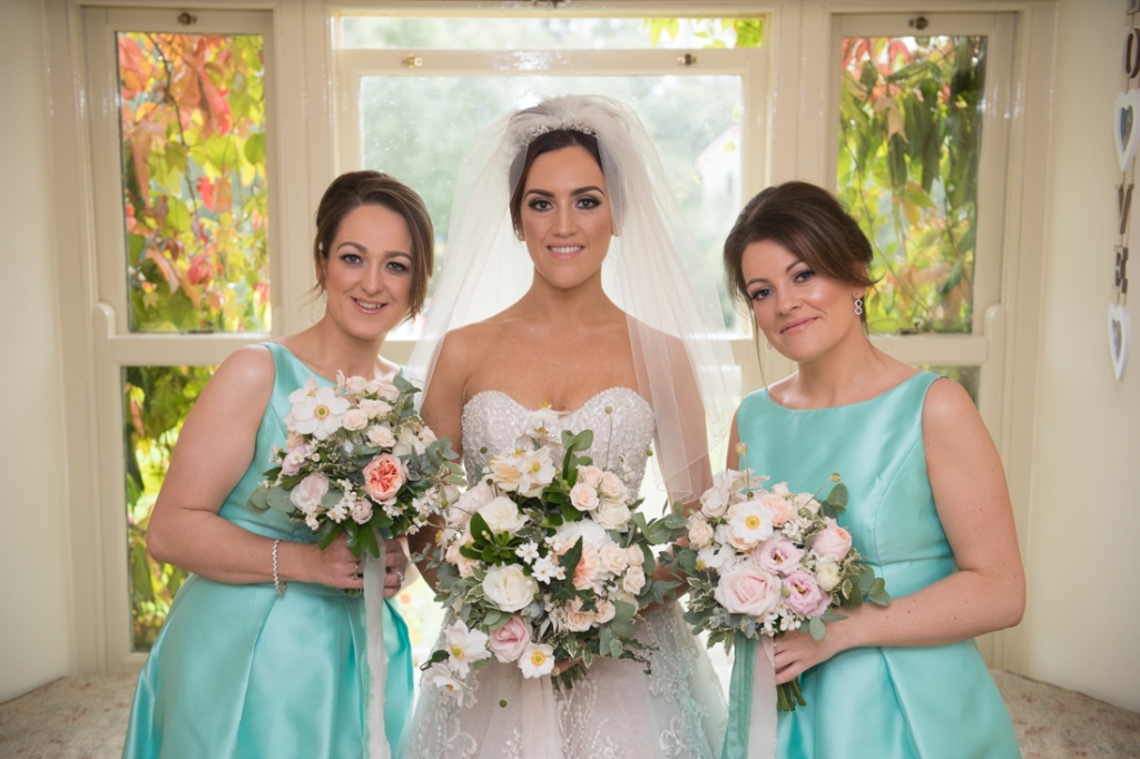 Bride and Bridesmaids holding their wedding bouquets