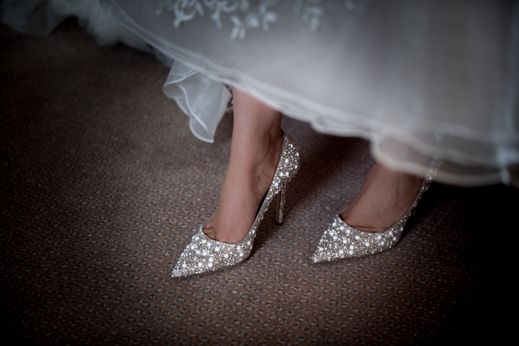 Bride wearing her Jimmy choo wedding shoes