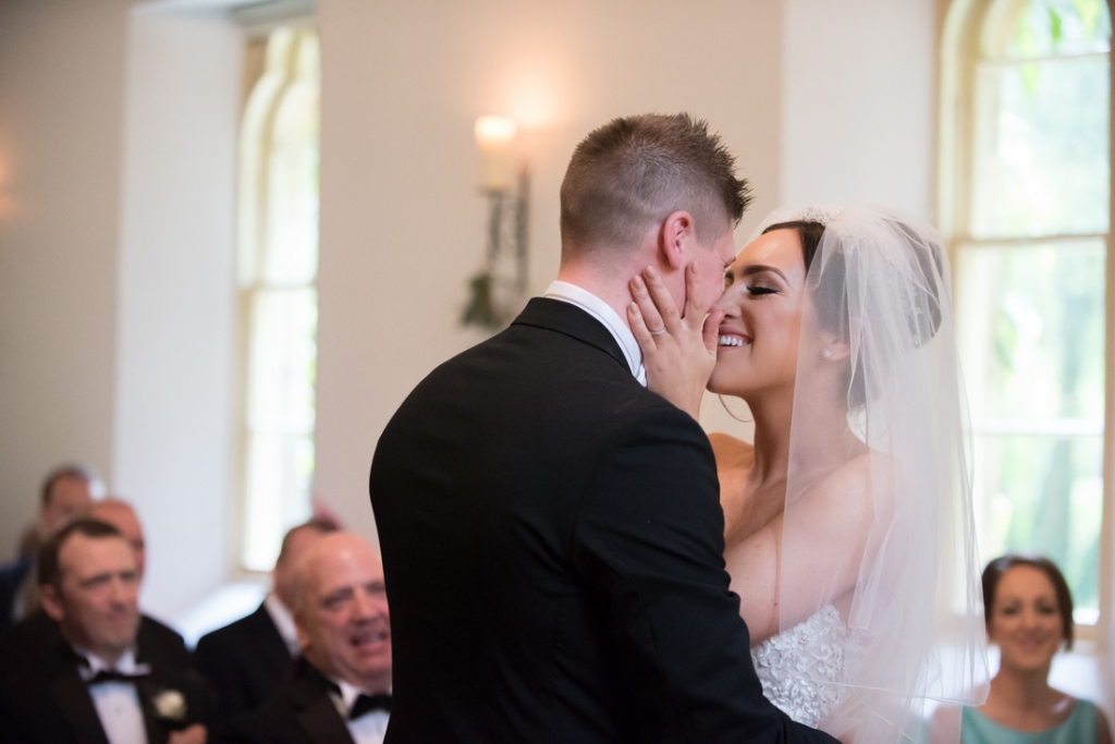 Bride and grooms first kiss as husband and wife