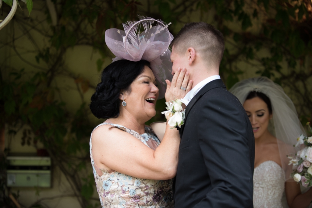 Mother of the Bride congratulating the newly married groom