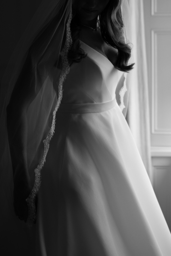 wedding dress joeanna caffrey flowers black and white photo