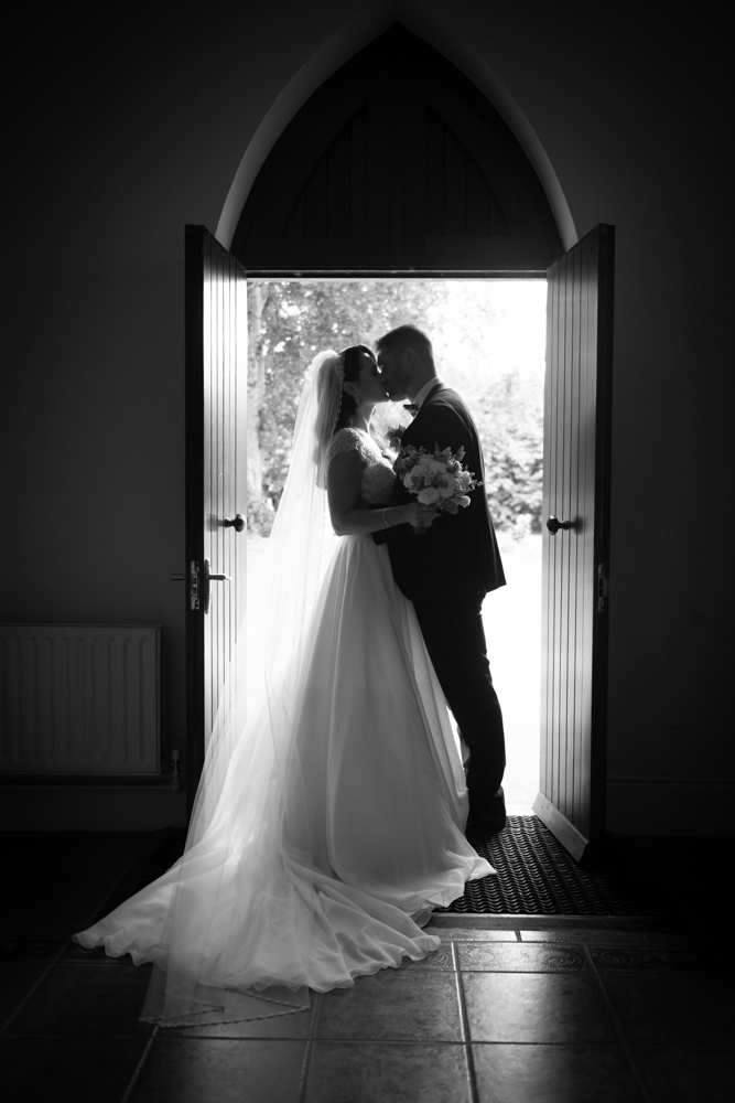 kiss at church door radisson blu wedding