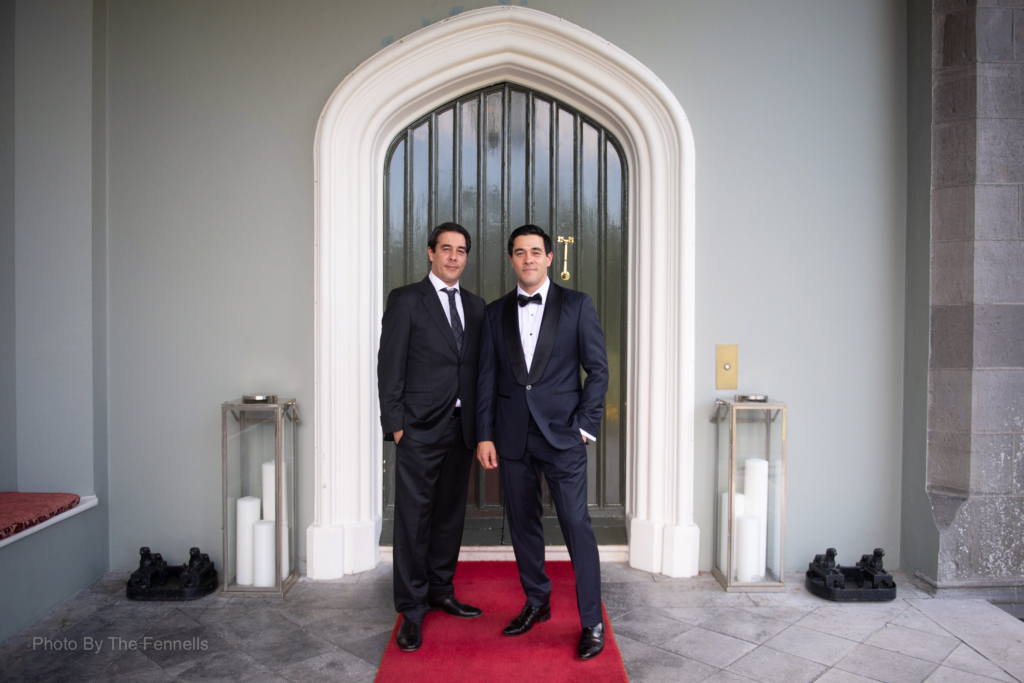 James Stewart and his twin brother standing at the front door of Luttrellstown castle