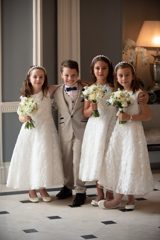 The flower girls and page boy for the home and away wedding