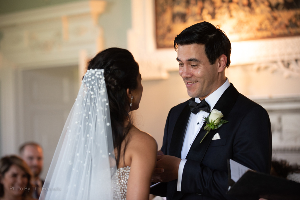 Sarah Roberts and James Stewart saying their wedding vows at their Luttrellstown Castle wedding