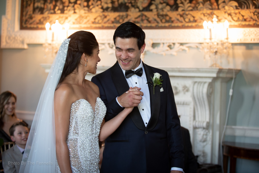 James Stewart and Sarah Roberts laughing and celebrating been just married at their Luttrellstown wedding ceremony