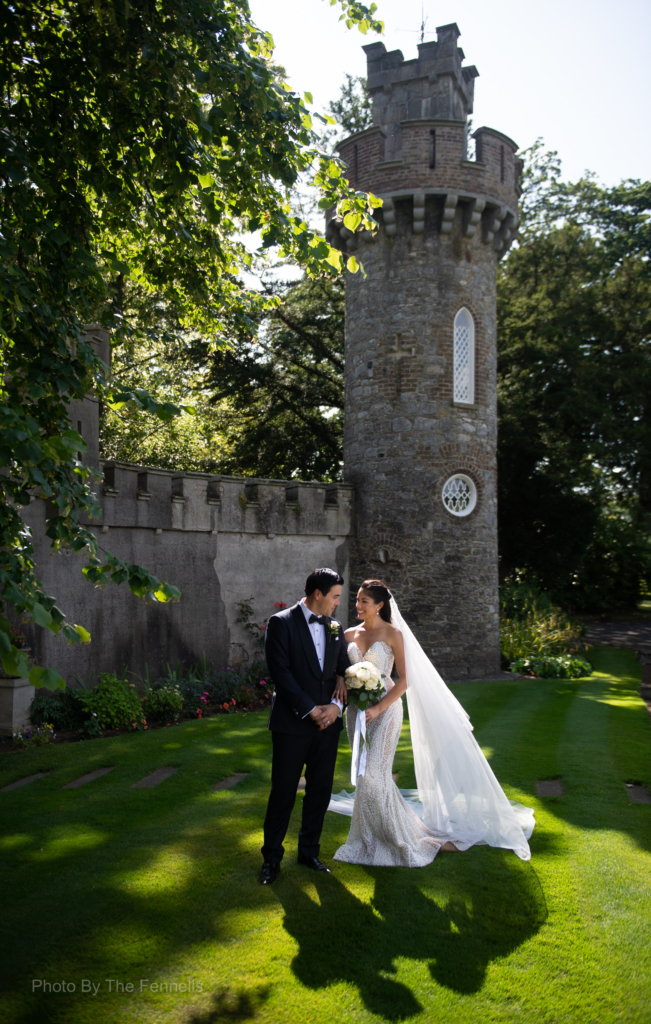 Sarah Roberts and James Stewart on the grounds of Luttrellstown Castle on their wedding day