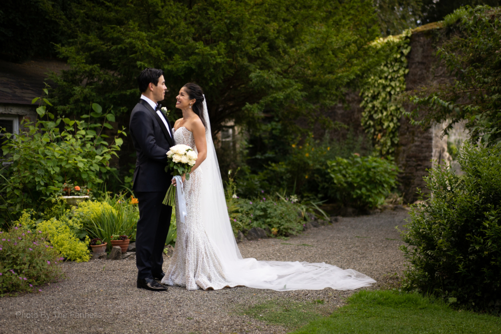 Sarah Roberts and James Stewart standing together on the grounds of Luttrellstown Castle