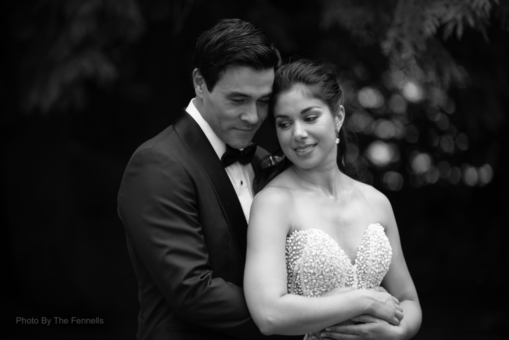 Sarah Roberts and James Stewart embracing on their wedding day at Luttrellstown