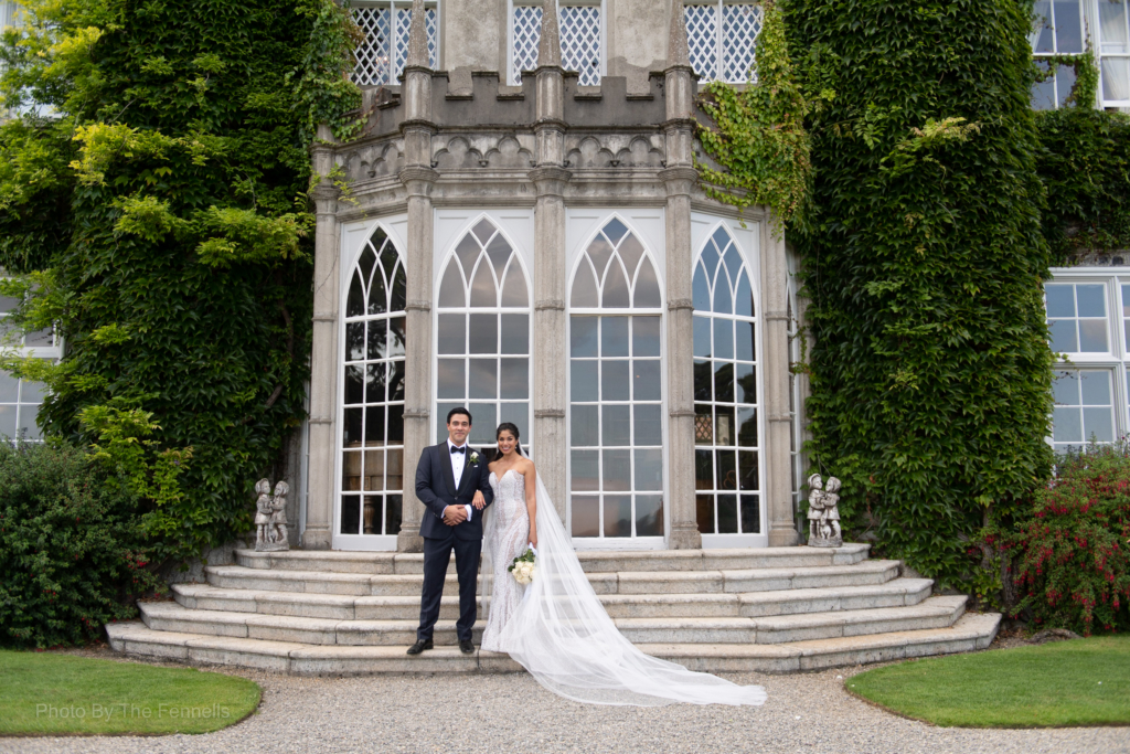 Sarah Roberts and James Stewart standing outside the steps at Luttrellstown Castle