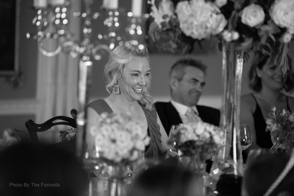 Guests laughing for the wedding speeches