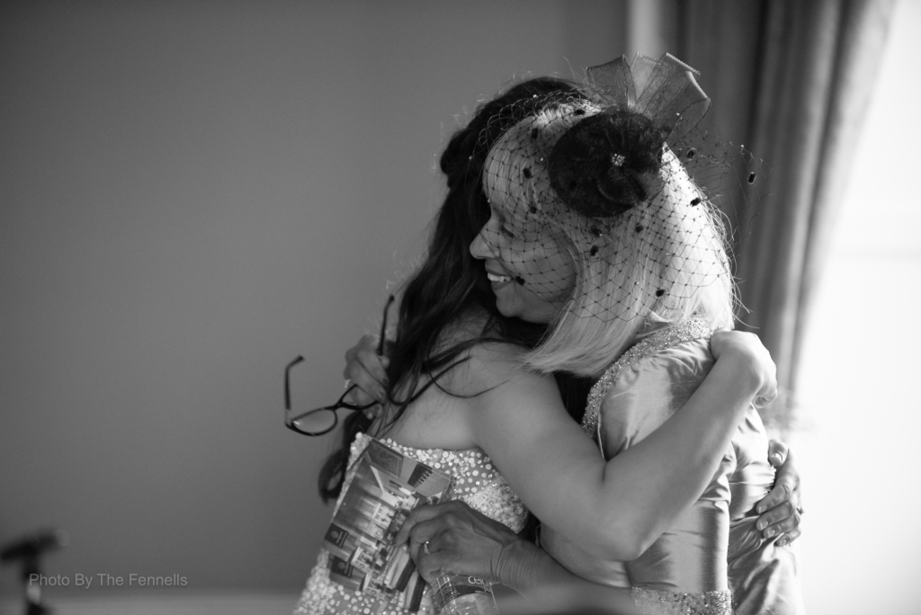 Sarah Roberts and her mum hugging after her wedding speech