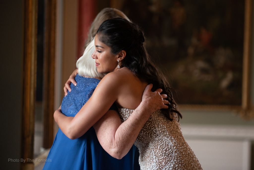 Sarah Roberts hugging her mother in law after her wedding speech