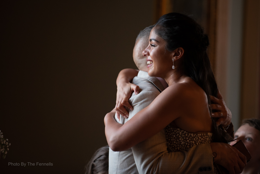 Sarah Roberts hugging her brother after his wedding speech
