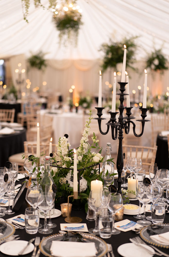Black candelabra and table setting for Castle Leslie wedding