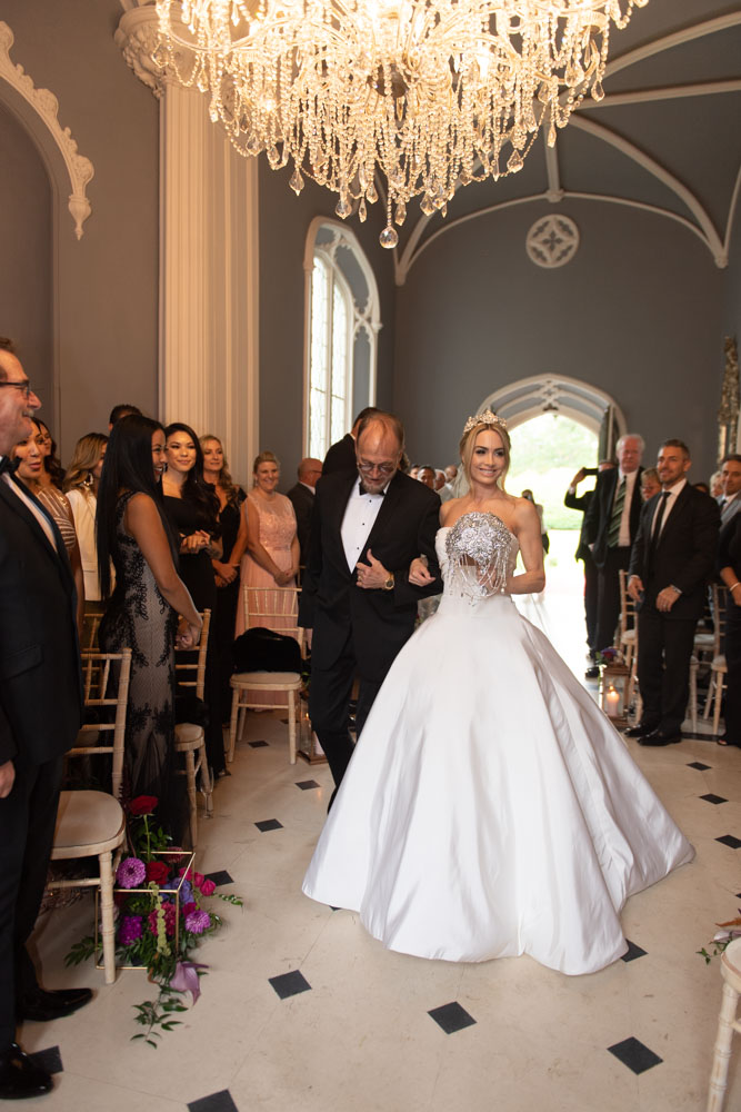 Bride and father of the Bride walking down aisle at Luttrellstown Castle