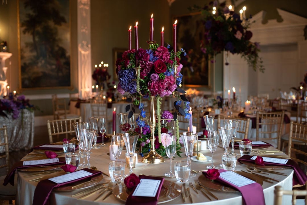 Table setting with flowers in dinner reception room at Luttrellstown Castle