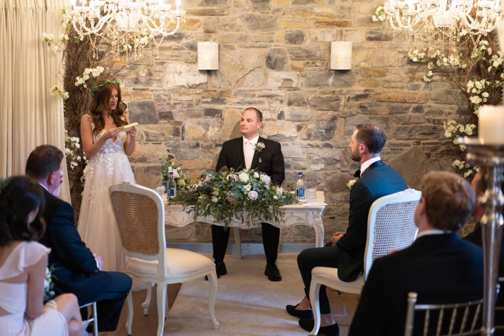 Bride giving her speech during the wedding ceremony at Ballymagarvey Village