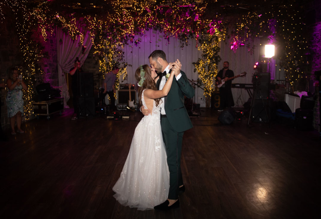 Bride and groom having their first dance at Ballymagarvey Village