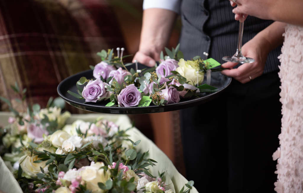 Mauve buttonhole flowers