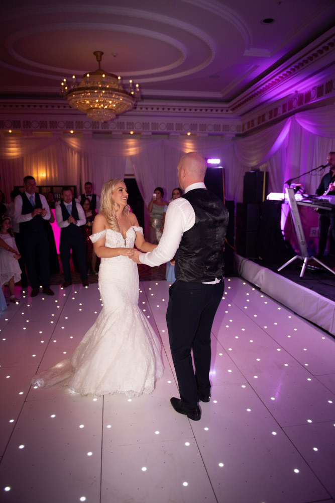 Bride and Grooms first dance on a white LED dance floor