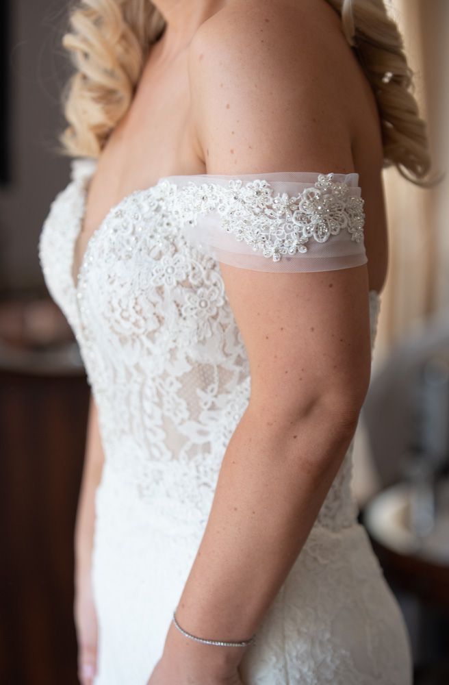 Lace shoulder detail on the Brides wedding dress