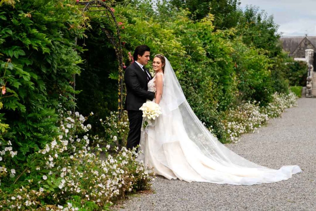 Bride and groom on the grounds of Kilkea Castle